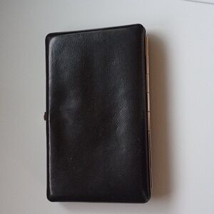 Abas Black Leather Silver Clutch With Clasp Closer And Card Slots.